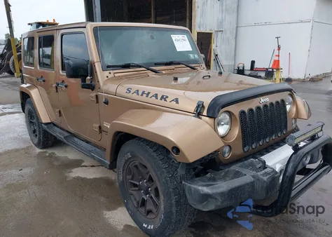 2015 Jeep Wrangler Unlimited Sahara из США, поврежденный, VIN 1C4BJWEG0FL653952